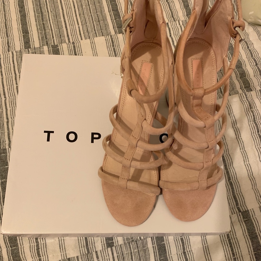 Nude and metallic silver heels